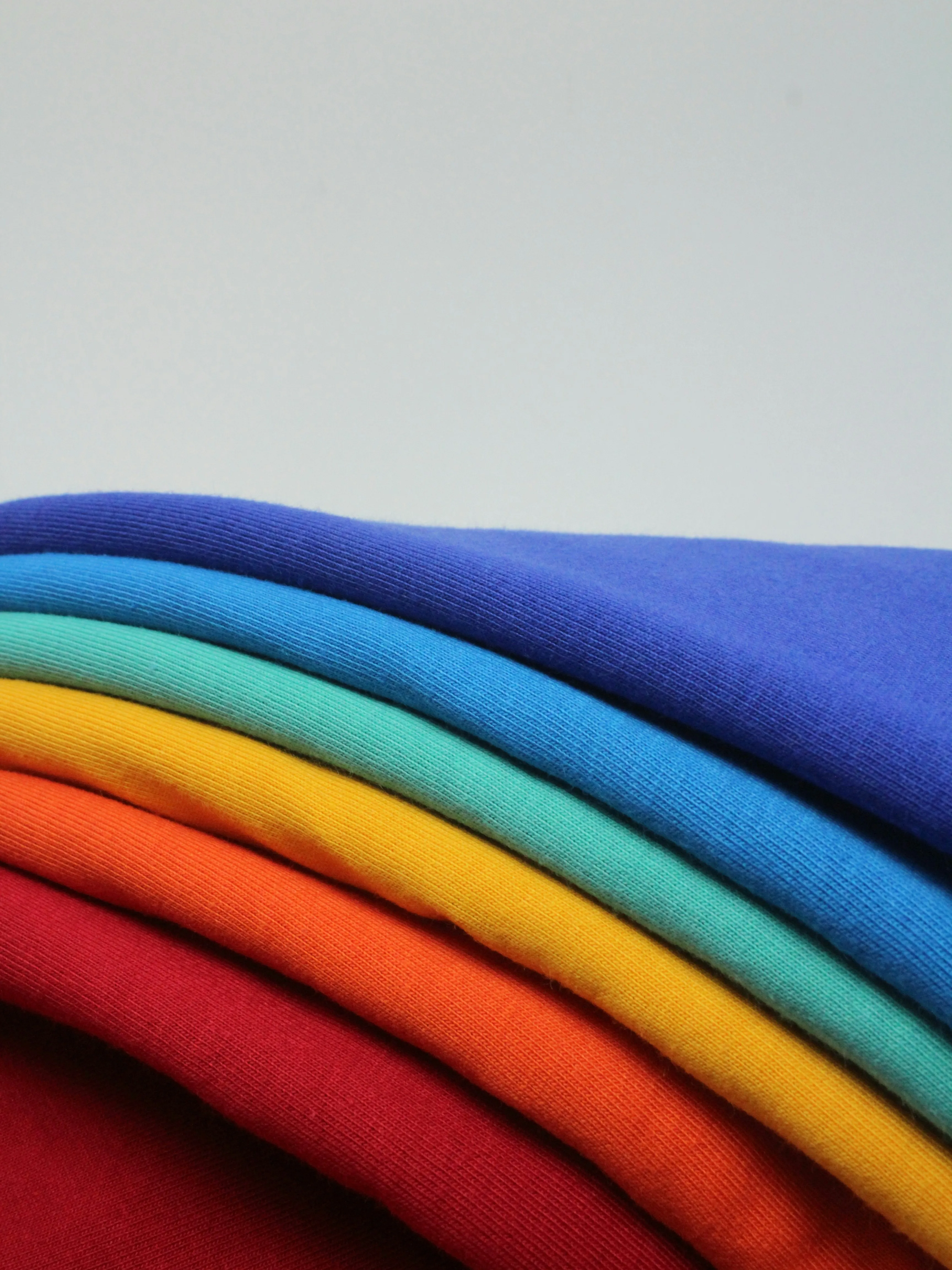 Warm-toned jacquard fabric with botanical motifs.